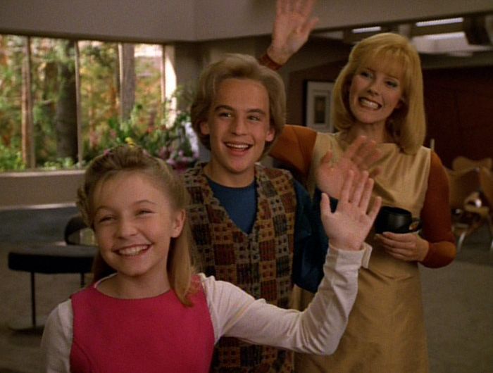 The Doctor’s idealized family waving goodbye
