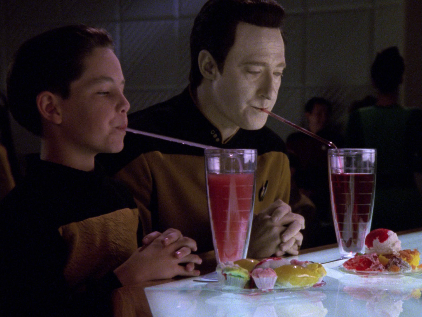 Timothy and Data enjoy a drink with long straws