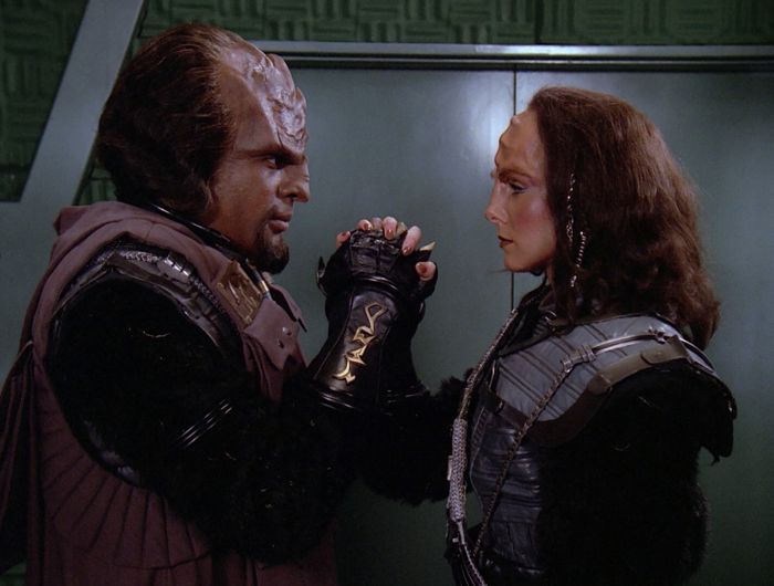 Worf and K’Ehlyr hold hands in the Klingon way